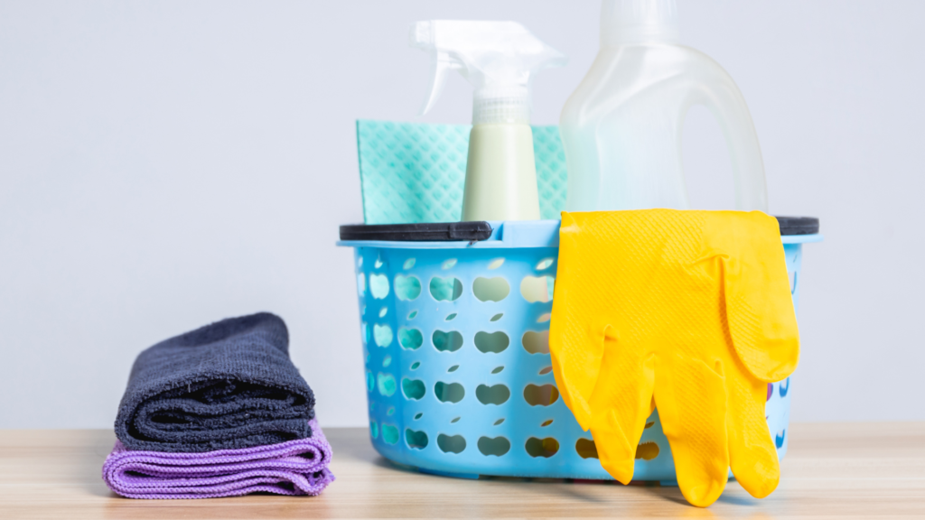 cleaning supplies in a basket on a table